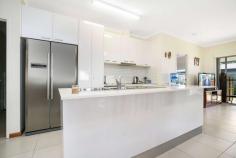  47/69 Boulter Road Berrimah NT 0828 $335,000 Investors snap up this immaculate modern residence with a reliable tenant already in place, or owner/occupiers get a hand paying down your mortgage then move into this stylish three-bedroom home when the lease expires. It is ideally set in a quality boutique complex, just moments to your choice of prestigious private and public schools, close to Holmes Jungle Nature Park, five minutes to Marrara Sporting Complex, and 10 minutes to Casuarina Square. • 	 Generous open-plan living/dining area captures abundant natural light • 	 Impressive chef's kitchen features stone bench tops and quality appliances • 	 Large island breakfast bar and double fridge recess also to kitchen • 	 Covered alfresco patio in bright, low-maintenance courtyard with lawn • 	 Master bedroom features a built-in robe and a chic modern ensuite • 	 Ensuite features an over-sized frameless glass shower and stone-top vanity • 	 Good-sized second and third bedrooms both feature built-in robes • 	 Stunning main bathroom with frameless glass shower and laundry facilities • 	 Split-system air conditioning, ceiling fans and easy-care floor tiles throughout • 	 Wide single carport plus an extra off-street parking space at front This quality residence backs onto a manicured park with children's play equipment that's at the heart of this quality boutique residential community that welcomes families, couples and downsizers alike. Enter into a central hallway at front with the second and third bedrooms - both with built-in robes - located on your right and left respectively. Continue into the light-filled living/dining area that offers generous open-plan living and flows onto the covered patio in the bright, low-maintenance courtyard. The stunning chef's kitchen with large island breakfast bar adjoins the living/dining area, and the generous master bedroom is off the living area at rear. You'll love the bright master bedroom that overlooks the rear courtyard and features a large built-in robe and a stylish modern ensuite. The quality continues in the sleek main bathroom that also features laundry facilities, and split-system air conditioning throughout ensures your year-round comfort. A wide single carport joins an extra off-street parking space at front. Act fast to secure this property in an in-demand new complex and organise your inspection today. Area Under Title: 224 Square Metres Planning Scheme Zone: MD (Multiple Dwelling) Darwin Council Rates: $1,200.00 per annum (Approximately) Body Corporate: North Management Body Corporate Fees: $873.20 per quarter (Approximately) Year Built: 2014 Property is currently leased until 7/2/2022 @ $420 per week (plus 3 year option) FEATURES: • 	 Air Conditioning • 	 Built-In Wardrobes • 	 Garden • 	 Terrace/Balcony 