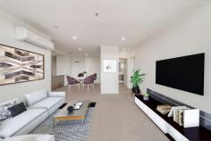  248/7 Irving Street Phillip ACT 2606 $515,000 Arguably the best 2 bedroom property within Trilogy, this stunning apartment set on the top floor will inspire. Soaring views across the Woden Valley towards Red Hill are never to be built out, bathing the accommodating floor plan with an abundance of natural light. Contemporary open plan living flows effortlessly through to a full-width balcony. The designer open plan kitchen, with plenty of storage, features stone benches, and high-end appliances. Each bedroom spacious in size, the master complete with floor-to-ceiling windows, walk through wardrobe, and ensuite. In addition, there are 2 secure side-by-side car spaces in the basement, though the proximity to the Woden town center will make walking a more convenient option in many cases. Within the building, a comprehensive gymnasium and resort-style pool facilities merely add to the quality of life on offer. Inspections are highly recommended. Features: • 	 Large living & dining areas • 	 EER 6 • 	 14m2 balcony • 	 80m2 internal living • 	 Level 12 • 	 Ceiling fan in the bedroom • 	 Window treatments already installed • 	 2 spacious bedrooms • 	 Reverse-cycle air conditioning • 	 Full height wall tiling to ensuite & bathrooms • 	 Visitor access via intercom • 	 Lift access from the basement • 	 2 carparks side-by-side & lockable storage in the basement • 	 Large heated outdoor swimming pool, BBQ areas & gym in the complex Rates: $348 p/qtr approx Land Tax (if rented): $428 p/qtr approx Body Corporate:$933.57 p/qtr approx FEATURES: • 	 Air Conditioning • 	 Built-In Wardrobes • 	 Close To Schools • 	 Close To Shops • 	 Close To Transport • 	 Secure Parking.. 