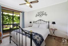  10 Edward Street Woomargama NSW 2644 $329,000 On a block of approx. 2,023m2, in the quiet rural village of Woomargama, NSW, sits a lovely low maintenance home. Single, couple or family, young or mature, would enjoy the benefits of a generous yard, powered workshop, two-car shed, and there is room here for lots of toys (or tools). The three good sized bedrooms with built-in robes and overhead fans are all serviced by a well laid out bathroom featuring a powder room, private toilet, separate shower, and bath. The large kitchen with ample storage and bench space is complemented by the very generous dining area, highlighted in timeless black and white tones, making it feel bright and spacious. The flowing floor plan then opens directly into a large lounge with a vaulted ceiling. So much room in here, there is an ideal position for your home office or the kid's toys. Heating and cooling are taken care of, with a split system plus ducted evaporative cooling and wood heating. Not to mention the natural cooling that comes from a beautifully trained grapevine right across the front and rear veranda's. A 45,000lt tank is ready to be connected to a pump to take care of the lush garden with lovely neat hedges all around. It's your oasis with vacant blocks on both sides of this property - you will appreciate your privacy and quiet enjoyment daily. Woomargama has a population of approx. 150 and supports a pub and a shop/Post Office. Holbrook is within approx. 15 min drive for all your shopping and schooling needs, for all other requirements it is an easy 30 min drive into Albury. This property will not last long, so call me today to arrange an inspection. 