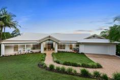  14 Trainstop Court Bli Bli QLD 4560 $1,395,000 This Hamptons inspired residence is hidden away in a very quiet part of the Sunshine Coast with a forest backdrop and a brilliant vista. Obvious to all who view is the quality of this home with its mix of indoor and outdoor living. The open plan design is complimented by the fact that there are areas where you can be by yourself at any time. Central to the home is a gourmet kitchen fitted with a 5 burner gas cook top and a 900mm country oven, stone bench-tops and a huge 4 metre island bench. There are three distinct covered outdoor entertainment areas ranging from a gazebo alongside a 10 x 5m resort style pool to a view deck on the main living and another off the lower level. This self-contained lower level represents options like guest accommodation, work from home with NBN coverage or even generate an income with rental possibilities. The professionally landscaped gardens are serviced by a computerised fully programmable irrigation system, plus town water, a quality bore and a bonus 20,000 litre rain water tank. As well as garaging for 4+ vehicles, there is a huge air-conditioned room (6.7 x 5m) would be perfect for jet-ski's, motor bikes, studio, fitness training, consultation or workshop. Only an inspection will show you just how good this very private residence will be for your family. • 	 Four spacious bedrooms all with robes plus a dedicated office • 	 Main bedroom with ensuite, walk-in-robe and private deck • 	 Covered alfresco dining areas • 	 Hardwood timber flooring throughout • 	 Extremely private location in quiet cul-de-sac • 	 Ducted air-conditioning & LED lighting • 	 Modern kitchen featuring stone bench tops • 	 Self-contained lower level with second double garage and large workshop • 	 Powered 6 x 3m shed • 	 Plenty of parking for additional cars or caravan • 	 6,883m2 allotment • 	 5 minutes to Bli Bli shopping centres • 	 18 Minutes to Sunshine Plaza. • 	 12 minutes to Sunshine Coast Grammar • 	 13km to Mudjimba Beach • 	 12 minutes to Sunshine Coast International Airport • 	 20 minutes to Sunshine Coast University FEATURES: • 	 Air Conditioning • 	 Built-In Wardrobes • 	 Dual Living • 	 Formal Lounge • 	 Garden • 	 Polished Timber Floor.. 