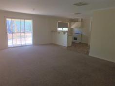  8/11 Pine Crescent Roxby Downs SA 5725 $175,000 This comfortable homette situated at the end of a cul-de-sac has open plan layout with kitchen adjacent to the family area. Ducted air-conditioning throughout, built in robes in the bedrooms. Kitchen featuring double sink, gas stove, oven, rangehood, double alcove, pantry, overhead cupboards and room for a dishwasher and microwave. The bathroom has a large bath/shower, exhaust fan and mirrored cabinet. There is a back verandah, garden shed with power, washing line and gates providing vehicle access to the backyard. 
