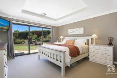  17 Lambourn Drive Wodonga VIC 3690 $989,000 Located in the tightly held Feltimber Creek Estate enjoying serene views of the surrounding rolling hills, this beautiful family home is sure to impress. Situated on a seldom found block of 5900m2, constructed by Alatalo, this stunning home features over 30 squares of living, ensuring the whole family can enjoy their own space. Comprising of four double bedrooms all including built storage, the master is complete with dual walk-in robes and a stunningly appointed ensuite, complete with double vanities, a separate shower, and a luxurious spa bath. An additional study adds further flexibility as a home office or 5th bedroom, while the study nook off the kids' bedrooms will mean homework gets done. Open plan living is at an optimum with three generous living areas on offer. A formal living zone to the front of the property is accompanied by a rumpus room, perfect for the kids. The open plan living and dining is situated to the back of the home and surrounds the master chef kitchen. With stone benchtops, an abundance of storage options, and Westinghouse appliances, the kitchen is perfectly designed for the cook of the family. Constructed with a focus on indoor and outdoor living, the huge alfresco area will be a hit with family and friends, perfect for summer BBQs while the kids splash in the in-ground salt chlorinated pool with automatic awning, a great sun-safe inclusion. Fully landscaped with low maintenance native plants, there is plenty of extra room for the dream shed to be built. Other notable features include an oversized double garage with internal access, double glazed windows throughout, and an industrial-strength split system providing cost-effective heating and cooling for the whole property. Enjoying a prestigious location with a resort lifestyle, this stunning property is the perfect family home. Call today! 
