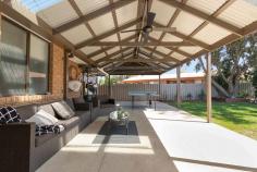  35 Lawson Drive Moama NSW 2731 $505,000 Home is where the heart is and this home would surely be that happy place. Located in the heart of Moama in a sought after locale overlooking a small reserve is 35 Lawson Drive. There are some new additions including an extension with a new large master bedroom with built in robes and ceiling fan, a stylish bathroom with a large shower, and a second living area or possibly a fifth bedroom. Other bedrooms also have ceiling fans and the second bathroom has a bath and shower. The kitchen has also had a modern style renovation which is open plan to include dining. The kitchen overlooks a fernery to one side and the rooms are filled with loads of light. Outside is a super spacious undercover entertaining area overlooking a generous garden. There is 2.5Kw solar on the roof, ducted heating and cooling and side access on both sides of the home if you have a caravan, boat or extra cars. An ideal home if you are downsizing, 1st home or investment. There is a lot more to brag about, but we would rather surprise you. Call now!! FEATURES: • 	 2.5 KW Solar • 	 Air Conditioning • 	 Built-In Wardrobes • 	 Close To Schools • 	 Close To Shops • 	 Close To Transport • 	 Fernery.. 