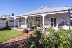 22 Kent Street West Busselton WA 6280 Great opportunity to purchase premium real estate within walking distance to Busselton CBD and the pristine waters of Geographe Bay. So rich in tradition. A haven of casual sophistication with a most elegant, renovated interior in desirable elevated position. This home showcases period features, large bedrooms and bathroom and inviting extended living out to garden courtyard. With seamless indoor/outdoor flow for carefree entertaining this exemplary home in an adored locale. It is a lucky find for those seeking character, quality, and lifestyle. Inspection is a must to fully appreciate what this property has to offer. INTERIOR FEATURES: - Jarrah flooring throughout - Large kitchen with cooktop, range hood & electric oven - Four large bedrooms - High ceilings throughout the home - Combustion fire in the Lounge room for those cold winter nights. - Ducted Reverse Cycle Air-conditioning - Family bathroom with shower, claw bath and vanity - Laundry room off the bathroom - Separate W.C. THE GULCH HERITAGE LISTED RESIDENCE - Separate dwelling at the rear of the property. - Is the earliest remaining civic building in Busselton - Built in 1856 by Captain John Molloy - Was used as a bond store, Resident Magistrate's office and police residence. - Includes shower, vanity, w.c. and electric HWS OUTSIDE FEATURES: - Wrap around verandah to watch the world go by - Outdoor shower - Side access - 2 x parking - Connected to main gas, water and deep sewer - Block size approx. 731m2 NEARBY FACILITIES - Queen Street 300m - Bus Stop 30m - Geographe Bay 550m - Busselton Jetty 875m - Fire Station 330m - Signal Park 475m - DOME Cafe 160m - Busselton Hospital 2.9km (Distances are approximate) Viewing of this WOW factor home will be held by appointment. Call Chris Rigoll on 0408 000 632 to book your place! 