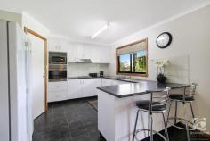  10 Edward Street Woomargama NSW 2644 $329,000 On a block of approx. 2,023m2, in the quiet rural village of Woomargama, NSW, sits a lovely low maintenance home. Single, couple or family, young or mature, would enjoy the benefits of a generous yard, powered workshop, two-car shed, and there is room here for lots of toys (or tools). The three good sized bedrooms with built-in robes and overhead fans are all serviced by a well laid out bathroom featuring a powder room, private toilet, separate shower, and bath. The large kitchen with ample storage and bench space is complemented by the very generous dining area, highlighted in timeless black and white tones, making it feel bright and spacious. The flowing floor plan then opens directly into a large lounge with a vaulted ceiling. So much room in here, there is an ideal position for your home office or the kid's toys. Heating and cooling are taken care of, with a split system plus ducted evaporative cooling and wood heating. Not to mention the natural cooling that comes from a beautifully trained grapevine right across the front and rear veranda's. A 45,000lt tank is ready to be connected to a pump to take care of the lush garden with lovely neat hedges all around. It's your oasis with vacant blocks on both sides of this property - you will appreciate your privacy and quiet enjoyment daily. Woomargama has a population of approx. 150 and supports a pub and a shop/Post Office. Holbrook is within approx. 15 min drive for all your shopping and schooling needs, for all other requirements it is an easy 30 min drive into Albury. This property will not last long, so call me today to arrange an inspection. 