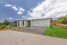  8 Tamarind Court Woombye QLD 4559 Whether you are looking for a "tree change" or are a young family wanting to raise your children somewhere a little bit "quieter", Woombye is a great location. This brand new beautiful 4 bedroom home is just minutes to the Woombye Village and shops, schools and bus stops and the train station. It is an easy 30 minute drive to the beaches; 25 minutes to the Sunshine Coast University Hospital and close to some of the best schools on the coast. This stylish home offers a spacious layout with open plan kitchen, dining and living flowing through large glass doors to a big patio with sweeping mountain views. High ceilings and large windows allow lots of natural light through and there is a separate family/media room. High quality fixtures and fittings include waterfall stone benchtops and butlers pantry in the kitchen, a 900mm freestanding gas cooktop and integrated microwave, stylish light pendants and Italian tiles throughout. Rooms are generously sized, bathroom and ensuite are beautifully finished with lots of extra storage in this home and enough space for a caravan or boat on the side of the property. It is only 20-30 minutes to the charming towns of Montville and Maleny with glorious views, rainforest walks and unique shopping and dining experiences or you can head to Mooloolaba to enjoy their fabulous restaurants and night life. As one of the villages of the Sunshine Coast hinterland, Woombye is close to everything due to its central location, yet far enough away from the busy tourists and traffic on the coast to enjoy a quiet and peaceful lifestyle. • 	 Tranquil setting in a great neighborhood • 	 Elevated with sweeping mountain views • 	 Brand new home with 7 year build warranty • 	 Weekly rent of $670-700 could be achieved • 	 Spacious, open plan living with high ceilings • 	 Quality fixtures & fittings & ample natural light • 	 Space for a Caravan or boat on the side of the property • 	 Well located close to all amenities & short drive to CBD & Beaches • 	 Home meets eligibility for the First Home Owners Grant of $15,000 for approved buyers Shortlist this property and book an inspection today! 