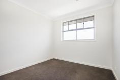  42 McBeath Street Hectorville SA 5073 $490k-$510k Completed in 2016, this Torrens titled custom home by Eastern Building Group offers two spacious levels, three bedrooms and three living areas for the modern family. Enjoying frontage onto McBeath Street among other quality homes, enter into the first downstairs living space between 2.7m ceilings and easy-care porcelain tiles to find an airy bright home. Facing the front of the home, a carpeted lounge enjoys wonderful natural light, while travelling down the hall, emerge in the open plan living and take in all the wonderful space, allowing you to configure your dining and lounge as you wish! Under LED downlighting, the kitchen offers contrast cabinetry and a sleek island bar, while stainless steel appliances include a dishwasher and gas cooktop for ultimate convenience. Upstairs to the carpeted sleeping quarters, find two bedrooms with built-in robes, separated from the main bedroom by a generous bathroom and third family room – meaning each bedroom gets their own living space to relax. The main bathroom offers a large shower and bath tub, while the master suite is complete with walk-in robe and ensuite bathroom. Surrounded by private good neighbour fencing, landscaping is easy care to the front and rear, with just enough lawn to satisfy pets and four-legged family members. Opening up glass sliding doors to the backyard, there’s plenty of room to extend and create an undercover dining area – or just kick back and enjoy dining Alfresco. It’s as effortless as it should be. Moments from Denis Morrissey Park, Campbelltown Library, public transport and local shopping, while just 6.5km to the city, everything you need is right here in Hectorville. Don’t miss: – The lounge downstairs can be easily converted into a bedroom or multi function entertaining area. – Super easy access to shopping centers: apart from the walking distance to Foodland and grocery store on St Bernard Rd, 5 mins drive to Newton shopping center with Woolies and Coles, 5 mins drive to Coles/Kmart Firle shopping center, 4 mins drive to Drakes Newton – Reverse cycle ducted air-conditioning – Guests’ powder room and generous laundry – Secure garage with auto panel lift door – Fully insulated internal & external walls – Exposed aggregate driveways and perimeter paths – Stroll to Romeo’s Foodland and public transport on Saint Bernards Road – Walking distance to East Torrens Primary and zoned to Norwood Morialta Middle and Senior Schools – Easy commute to the Adelaide CBD down Montacute and Payneham Roads.. 