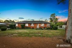  65 Kriewaldt Circuit Higgins ACT 2615 $695,000 Sited on a level corner block, surrounded by established homes on large leafy blocks this tastefully updated and extended family home offers so much for a growing family both inside and outside. THE HOME An inspection of this immaculate home will impress those looking for flowing living spaces. There's a formal lounge and dining room plus an informal meals area adjacent to the kitchen plus a large family room that flows out onto the walled courtyard. The central kitchen has been updated and features stone bench tops, a new four burner gas cooktop, Miele oven, Bosch dishwasher and excellent storage space. The main bedroom includes an ensuite bathroom and built-in wardrobe. There's three additional bedrooms, two of which also feature built-ins. As you walk through it's apparent this has been a well maintained and cared for home. Upgrades include the renovated bathroom, new LED lighting in most of the rooms, polished floorboards throughout, Crimsafe security screen doors and the roof has recently been repointed. To keep everyone comfortable year round there’s a ducted gas heating system and split system air-conditioning in the family room. The private, north facing walled courtyard is great for entertaining especially on balmy summer evenings. While adults can enjoy this area, the kids aren’t forgotten. From the family room step onto a timber deck that overlooks a grassed and fully fenced yard. Let the kids loose! The property also features a double carport with an attached storage shed. Being a corner block there's plenty of off-street parking available. THE LOCATION Located in a popular suburb, the property is centrally located between Cranleigh School & Kingsford Smith School. It's just a two minute walk to Starke Street, public transport and nearby sports fields. It's a 5 min walk to the nearby Kippax Centre and Raiders Club and there's convenient access to Civic (17mins), Parliamentary Triangle (17 mins) and the southern Canberra via quick access to William Hovel Drive. PROPERTY FEATURES Spacious 4 bedroom family home Large flat corner block with gated side access North facing living areas L shaped lounge/dining area Meals area adjoining kitchen Large family room opens onto rear courtyard Updated kitchen - stone bench tops, new gas cooktop & Bosch dishwasher Main bedroom with ensuite & built-in robe Renovated bathroom Ducted gas heating & split system AC in family room Extensive LED downlighting Timber floorboards Recently painted throughout Crimsafe security screen doors Roof has recently been repointed Established gardens Enclosed entertainment courtyard Double carport & large storage shed.. 