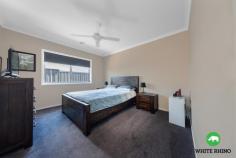  13 Dolly Street Googong NSW 2620 $75,000-$750,000 The benefits of living in a well thought out and engaged community like Googong speaks for itself. This beautiful easy care, low maintenance, quality 4 bedroom home has it all. Welcoming you into the light filled home decorated in neutral tones, the floorplan creates balance and flow. The residence reveals a selection of both informal and formal areas, with a functional floorplan for both entertaining and living. A generous formal lounge, living/ dining area and four spacious bedrooms all provides an idyllic family sanctuary offering comfort, space and ease of living . The master bedroom is spacious and hosts a ceiling fan, large walk in robe and ensuite with shower and floating vanity. Three comfortable sized bedrooms follow all with built-in robes and two with ceiling fans and a shared second bathroom with bath, shower and vanity. A well- equipped striking kitchen complete with stone bench tops, quality stainless steel appliances including: double Miele ovens, gas cooktops and space to install an additional wine fridge. The kitchen hosts feature glass splashbacks, pendant lights and an island bench with breakfast bar. Interiors transition to a sun-drenched outdoor alfresco area, which overlooks the child-friendly spacious yard. Positioned only a short walk to Beltana Park, Aquatots, tennis courts and public transport, this is the ideal location. Offering an easy to maintain lifestyle in a quiet and convenient location, with easy access in and out of Googong This outstanding home won't last long, if you're looking for a well maintained family home then look no further. Features: Master with walk-in robe and ensuite 3 Additional bedrooms with built in robes Ceiling fans in three bedrooms Formal lounge Large open living/dining area Kitchen with stone bench tops & breakfast bar Double Miele ovens, bottom oven pyrolyric self cleaning Ample bench & cupboard space Gas cooktops & pantry Open space to fit wine fridge (1430 high by 690 wide) Laundry Alfresco area Ducted heating Double glazed windows Double lock up garage with internal access Landscaped gardens FEATURES:  Area Views  Built-In Wardrobes  Close to Transport  Close to Shops  Close to Schools  Carpeted  Window Treatments.. 