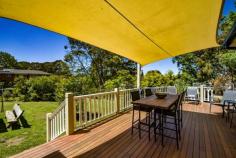  36 Nerrim St Bundanoon NSW 2578 $995,000 This old gem was the original homestead in Nerrim Street with construction started in 1953 and sympathetically restored in the last 12 months. The current owners have retained much of the charm and character of this cottage whilst ensuring modern convenience for an ease of living. All the external fibro has been removed, walls fully insulated and fibro replaced with Heritage profile timber weatherboards. The iron roof has been fully restored and new downpipes and guttering added; Old world charm throughout with high ceilings, timber floor boards, French doors, stained glass, claw foot bath, high skirtings and so much more; Cosy country kitchen with quality appliances offers views over the sun drenched north facing garden and flows to the intimate breakfast room or possible home office with its own entry off the front deck, both a lovely place for your morning coffee or work from home space; Main living area is grand in scale with a gas fireplace the focal point of this generous space which offers formal dining and lounge and accesses the rear deck via French doors; Master suite is also sizeable with excellent double robes and fully renovated period bathroom with claw foot bath; Guest/family wing offers another 3 double light filled rooms with views over the cottage gardens all serviced via the main bathroom which is also fully renovated; Laundry has excellent storage options and accesses the rear yard; Main heating is via a gas fireplace together with reverse cycle split a/c; and Nobo room heaters in all bedrooms and hallway. The house is fully insulated, with insulation under floor in certain rooms as well. Electricity charges are off-set via the 6Kw solar system with 5Kw inverter; Positioned to maximise the northern sunshine, the home offers a bright and airy feel throughout, further enhanced by the 9ft ceilings and large timber windows; Outdoor entertaining is via a long east facing deck overlooking the rear established garden and pond with large open lawn areas for the family to enjoy or the front terrace bathed in northern sunshine under the vine draped pergola. The property is fully fenced with excellent side access for the caravan or trailer with a double garage to the frontage perfect for 2 cars and workshop space. The garden is a lovely mix of colour, old oak trees, shrubs and roses. Situated in a quiet cul-de-sac, this elevated property takes in a green distant local outlook and is only a 15 minute casual stroll to the village of Bundanoon. 