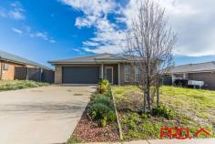  4 Magpie Drive Tamworth NSW 2340 $433,000 This well maintained family home is located in the popular estate of Lampada, close to local shopping complex, Farrer High School and Carinya Christian School. Offering four well-sized bedrooms with built in wardrobes and walk in robe to the master, two bathrooms, open plan kitchen, lounge and dinning for all of the family. Situated on a 700m2 block with ample yard space and garden shed. Features a double lock up garage, walk in pantry, outdoor alfresco area and ducted reverse cycle air conditioning for your year round comfort. Perfect for a young family or investor. Don't miss this opportunity. Contact Dean Cummins 0429 663 995 and Amy Hughes 0417 666 773 today! 