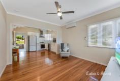  198 Rainbow St Sandgate QLD 4017 Need a home with nothing to do, then look no further this could be the one for you, so stop your searching now! Offering a great combination of modern finishes with traditional Queenslander features the home offers low maintenance living in the heart of Sandgate. Located within just a few minutes stroll from the Sandgate foreshore the home sits perfectly on 670 square meters of prime bayside real estate. The yard is fully secured, well manicured and low maintenance with well established gardens. Internally you have polished timber floors throughout the air conditioned open plan kitchen, dining and lounge room. The 2 carpeted bedrooms are generously sized with large built-in robes offering great storage space.  For entertaining the large rear undercover patio will cater for family events or bbq's with friends and neighbors. Relaxation with a quiet drink can be simply enjoyed on the front deck at the end of a days work. There is a huge double carport as well as under-house secured garage space for a single vehicle. Also there is plenty of storage space for bikes, surfboards, canoes etc to compliment and complete the home. Sandgate Village and the Full Moon Hotel are virtually on your doorstep, along with public transport and public park areas. Sandgate is hot property right now and offerings are few and far between, so don't delay call today or be disappointed. 