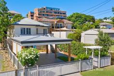  198 Rainbow St Sandgate QLD 4017 Need a home with nothing to do, then look no further this could be the one for you, so stop your searching now! Offering a great combination of modern finishes with traditional Queenslander features the home offers low maintenance living in the heart of Sandgate. Located within just a few minutes stroll from the Sandgate foreshore the home sits perfectly on 670 square meters of prime bayside real estate. The yard is fully secured, well manicured and low maintenance with well established gardens. Internally you have polished timber floors throughout the air conditioned open plan kitchen, dining and lounge room. The 2 carpeted bedrooms are generously sized with large built-in robes offering great storage space.  For entertaining the large rear undercover patio will cater for family events or bbq's with friends and neighbors. Relaxation with a quiet drink can be simply enjoyed on the front deck at the end of a days work. There is a huge double carport as well as under-house secured garage space for a single vehicle. Also there is plenty of storage space for bikes, surfboards, canoes etc to compliment and complete the home. Sandgate Village and the Full Moon Hotel are virtually on your doorstep, along with public transport and public park areas. Sandgate is hot property right now and offerings are few and far between, so don't delay call today or be disappointed. 