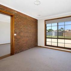  7 Lachlan Court West Wodonga VIC 3690 $399,000 Located in a West Wodonga Court close to Sporting facilities, Shopping Centre and Wodonga TAFE/La Trobe University, this is great family home. Offering 4 Bedrooms, the master at the front of the property has an ensuite and walk-in robe, the three remaining bedrooms are at the back of the property with access through to another bedroom or living room. Good size living area with the main lounge at the front and an open plan kitchen dining. The Outside offers an allotment of 858m2, double carport with access through to the backyard for a shed. With Some renovations and updating this could be your forever home. Ring today for an inspection! FEATURES: • 	 Air Conditioning • 	 Built-In Wardrobes • 	 Close To Schools • 	 Close To Shops • 	 Close To Transport • 	 Garden.. 