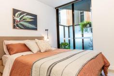  103/108 Haines St North Melbourne VIC 3051 $700,000 - $750,000 A light filled and contemporary first floor apartment with perfect park views of Gardiner Reserve. Surrounded by tree lined streets, a desirable lifestyle location within walking distance from parks, swimming facilities, public transport, cafés/restaurants and the Vic Market/CBD. The apartment features : • 2 bedrooms, both with built in robes. The primary bedroom accompanied by an ensuite and a compact private terrace. • 2 bathrooms, beautifully fitted. A second bathroom with built in European laundry. • Beautiful open plan living with indoor-outdoor flow. • High quality finished kitchen with Stone benches and Miele kitchen appliances. • Secure entry and well placed car space (no stacker) with keyless fob entry and bike storage available. • Same floor storage cage. • Well maintained building with building manager onsite 6 days. • Shared landscaped rooftop garden with BBQ facilities. This beautiful apartment situated in the stunning Reflections building is located on a quiet street just 2km from the CBD. Only 12 mins walk to Errol Street and within the coveted University High School zone.. 