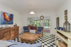  5957 Wisemans Ferry Road Gunderman NSW 2775 $750,000 So rare to find an approved house with a licensed jetty right on the beautiful Hawkesbury River. On a semi-rural 1160 square metre block is this character and stylish, light and bright weatherboard cottage. Consisting of 2 double bedrooms with approved additional studio & wonderful, fully covered & bright wide verandahs and pavilions for abundant outdoor living. There are multiple spacious indoor living areas and a combustion fire and reverse cycle air conditioning provide year-round comfort. A spacious kitchen and modern bathroom complete the package. Mangroves frame the jetty, providing a delightful arched covered pathway to the river. There is good flat grassed yard space, with a quaint gazebo, permeated by the constant twitter of bird life. The studio offers a separate space along with a self-contained bathroom and kitchen facility and connects via the covered deck to the main home. 