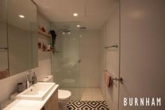  205/205 Ballarat Road Footscray VIC 3011 $475,000 - $520,000 “The Hugo” has successfully captured contemporary low-maintenance living, wrapped it in a secure and efficient boutique building; and positioned itself centrally in one of Melbourne’s sought-after cosmopolitan suburbs. A spacious 2 bedroom apartment occupying 73.5m2 and positioned quietly at the rear of the building. This home opens to an Easterly facing private balcony ideal for entertaining amongst the City lights. Floor-to-ceiling and wall-to-wall glass frames the views while filling the apartment with an airy ambience. The open plan living layout separates the 2 spacious bedrooms. Natural elements such as timber floors, wool carpets, and concrete feature walls merge to provide a relaxing sanctuary. Pick up the pace and prepare to entertain in your sizeable kitchen with European stainless-steel appliances wrapped in stone. Ample storage, concealed fridge and moveable island bench make this flexible space ideal for any occasion. Retire to your master suite serviced by a large ensuite finished in stone, oversized shower, mirrored cabinetry, and full width openable window. The central 2nd bathroom continues the trend. Underpinned by its close proximity to the city (12min drive), extensive transport links, a strong education centre, famous food markets, major shopping precincts and its burgeoning restaurant and café scene makes this such a compelling destination for investors and owner occupiers alike. Other features include- – Bosch appliances with gas cooktop – Timber floors – Plush carpets – Modern tiles – Shaving cabinets – Rain Shower Heads – Laundry space in main bathroom – Double glazing – Dual blinds – NBN ready – CCTV security throughout building – Secure carpark – Storage cage.. 