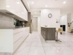  2/49 Sunshine Blvd Broadbeach Waters QLD 4218 $1,399,000 This stunning two level Villa is not to be missed. Located in one of Broadbeach Waters most desired locations, situated only 300 mtrs (approx) to South East Queenslands premier shopping centre … Pacific fair, as well as a short walk to Star Casino, golden beaches and the bustling restaurant scene of Broadbeach, you will find it hard to find a better location on the Gold Coast . This ultra modern two level Villa will suit your every lifestyle need. Large open plan living, dining & kitchen all opening out to your waterside alfresco entertaining area overlooking a large sun soaked swimming pool and wide waterway. 4 Large bedrooms all ensuited. Master with stunning water and hinterland views from a private balcony, and a bathroom that wouldn’t be out of place in a 5 star hotel. Second level kids zone/ 5th bedroom, ducted air throughout, security alarm. Shared pontoon for fishing. This home has it all. Extremely realistic vendor has priced this for an immediate sale. Nothing in the area will compare to this property for size, luxury, location and price. All furniture and bedding can be purchased separately if desired. If you find better … Buy it !! This property wont last!! 