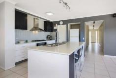  2 Auhl Court West Wodonga VIC 3690 $720,000 Located in one of Wodonga's established estates, this home is ideal for the family wanting to entertain and room to move. Offering 4 generous size bedrooms, huge master with ensuite, walk-in robe, large study, separate formal lounge and dining and additional theatre of rumpus room. The functional galley style kitchen is completed with heaps of storage, 900m2 gas cooktop, dishwasher and walk in Pantry. Adjacent is a fabulous extended outdoor area where you can enjoy and unwind and entertain friends. Outside offers an allotment of 4002m2, seldom found in today's market. With room to improve the outside, erect a shed, pop in a tennis court or cricket pitch. Ring today for an inspection! FEATURES: • 	 1 Acre Allotment • 	 5 KW Solar Power • 	 Air Conditioning • 	 Built-In Wardrobes • 	 Close To Schools • 	 Formal Lounge • 	 Garden.. 