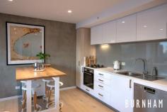  205/205 Ballarat Road Footscray VIC 3011 $475,000 - $520,000 “The Hugo” has successfully captured contemporary low-maintenance living, wrapped it in a secure and efficient boutique building; and positioned itself centrally in one of Melbourne’s sought-after cosmopolitan suburbs. A spacious 2 bedroom apartment occupying 73.5m2 and positioned quietly at the rear of the building. This home opens to an Easterly facing private balcony ideal for entertaining amongst the City lights. Floor-to-ceiling and wall-to-wall glass frames the views while filling the apartment with an airy ambience. The open plan living layout separates the 2 spacious bedrooms. Natural elements such as timber floors, wool carpets, and concrete feature walls merge to provide a relaxing sanctuary. Pick up the pace and prepare to entertain in your sizeable kitchen with European stainless-steel appliances wrapped in stone. Ample storage, concealed fridge and moveable island bench make this flexible space ideal for any occasion. Retire to your master suite serviced by a large ensuite finished in stone, oversized shower, mirrored cabinetry, and full width openable window. The central 2nd bathroom continues the trend. Underpinned by its close proximity to the city (12min drive), extensive transport links, a strong education centre, famous food markets, major shopping precincts and its burgeoning restaurant and café scene makes this such a compelling destination for investors and owner occupiers alike. Other features include- – Bosch appliances with gas cooktop – Timber floors – Plush carpets – Modern tiles – Shaving cabinets – Rain Shower Heads – Laundry space in main bathroom – Double glazing – Dual blinds – NBN ready – CCTV security throughout building – Secure carpark – Storage cage.. 