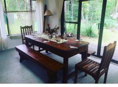  5957 Wisemans Ferry Road Gunderman NSW 2775 $750,000 So rare to find an approved house with a licensed jetty right on the beautiful Hawkesbury River. On a semi-rural 1160 square metre block is this character and stylish, light and bright weatherboard cottage. Consisting of 2 double bedrooms with approved additional studio & wonderful, fully covered & bright wide verandahs and pavilions for abundant outdoor living. There are multiple spacious indoor living areas and a combustion fire and reverse cycle air conditioning provide year-round comfort. A spacious kitchen and modern bathroom complete the package. Mangroves frame the jetty, providing a delightful arched covered pathway to the river. There is good flat grassed yard space, with a quaint gazebo, permeated by the constant twitter of bird life. The studio offers a separate space along with a self-contained bathroom and kitchen facility and connects via the covered deck to the main home. 