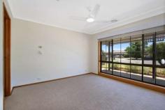  7 Lachlan Court West Wodonga VIC 3690 $399,000 Located in a West Wodonga Court close to Sporting facilities, Shopping Centre and Wodonga TAFE/La Trobe University, this is great family home. Offering 4 Bedrooms, the master at the front of the property has an ensuite and walk-in robe, the three remaining bedrooms are at the back of the property with access through to another bedroom or living room. Good size living area with the main lounge at the front and an open plan kitchen dining. The Outside offers an allotment of 858m2, double carport with access through to the backyard for a shed. With Some renovations and updating this could be your forever home. Ring today for an inspection! FEATURES: • 	 Air Conditioning • 	 Built-In Wardrobes • 	 Close To Schools • 	 Close To Shops • 	 Close To Transport • 	 Garden.. 