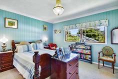  36 Nerrim St Bundanoon NSW 2578 $995,000 This old gem was the original homestead in Nerrim Street with construction started in 1953 and sympathetically restored in the last 12 months. The current owners have retained much of the charm and character of this cottage whilst ensuring modern convenience for an ease of living. All the external fibro has been removed, walls fully insulated and fibro replaced with Heritage profile timber weatherboards. The iron roof has been fully restored and new downpipes and guttering added; Old world charm throughout with high ceilings, timber floor boards, French doors, stained glass, claw foot bath, high skirtings and so much more; Cosy country kitchen with quality appliances offers views over the sun drenched north facing garden and flows to the intimate breakfast room or possible home office with its own entry off the front deck, both a lovely place for your morning coffee or work from home space; Main living area is grand in scale with a gas fireplace the focal point of this generous space which offers formal dining and lounge and accesses the rear deck via French doors; Master suite is also sizeable with excellent double robes and fully renovated period bathroom with claw foot bath; Guest/family wing offers another 3 double light filled rooms with views over the cottage gardens all serviced via the main bathroom which is also fully renovated; Laundry has excellent storage options and accesses the rear yard; Main heating is via a gas fireplace together with reverse cycle split a/c; and Nobo room heaters in all bedrooms and hallway. The house is fully insulated, with insulation under floor in certain rooms as well. Electricity charges are off-set via the 6Kw solar system with 5Kw inverter; Positioned to maximise the northern sunshine, the home offers a bright and airy feel throughout, further enhanced by the 9ft ceilings and large timber windows; Outdoor entertaining is via a long east facing deck overlooking the rear established garden and pond with large open lawn areas for the family to enjoy or the front terrace bathed in northern sunshine under the vine draped pergola. The property is fully fenced with excellent side access for the caravan or trailer with a double garage to the frontage perfect for 2 cars and workshop space. The garden is a lovely mix of colour, old oak trees, shrubs and roses. Situated in a quiet cul-de-sac, this elevated property takes in a green distant local outlook and is only a 15 minute casual stroll to the village of Bundanoon. 