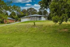  11 Bromhall Rd Bundanoon NSW 2578  $975,000 Four years young, this fabulous G J Gardner home offers split level living and the perfect floor plan for the family or entertainer. The modern rendered home is situated in an elevated position with a lovely green local outlook on a substantial parcel of land awaiting landscaping and gardens. Quality galley kitchen with Caesar stone bench tops, Smeg appliances, large island and generous butler’s pantry; Lounge and dining are directly off the kitchen and flow to the alfresco area via bi-fold doors; On the lower split level is the purpose built media room, home office nook and master suite with walk in robe and well proportioned ensuite; The main living level also houses the 3 double bedrooms with built in robes, large modern family bathroom with separate wc and laundry with external access; Large windows throughout (some of which have thickened glass for noise reductions) and 9 foot ceilings in the main kitchen/ living area add to the sense of space and ensure maximum natural light to this immaculate modern home; Heating is via the s/c wood fire and gas bayonets with quality insulation, sarking and an excellent cross breeze for summer months. The wide welcoming entry hall offers internal access to the double garage with workshop space. While there is a small retained garden off the alfresco area, the remainder of the land is sweeping lawn areas with fencing on 3 sides. Excellent proximity to the village shops and all lovely Bundanoon has to offer. 