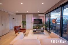 205/205 Ballarat Road Footscray VIC 3011 $475,000 - $520,000 “The Hugo” has successfully captured contemporary low-maintenance living, wrapped it in a secure and efficient boutique building; and positioned itself centrally in one of Melbourne’s sought-after cosmopolitan suburbs. A spacious 2 bedroom apartment occupying 73.5m2 and positioned quietly at the rear of the building. This home opens to an Easterly facing private balcony ideal for entertaining amongst the City lights. Floor-to-ceiling and wall-to-wall glass frames the views while filling the apartment with an airy ambience. The open plan living layout separates the 2 spacious bedrooms. Natural elements such as timber floors, wool carpets, and concrete feature walls merge to provide a relaxing sanctuary. Pick up the pace and prepare to entertain in your sizeable kitchen with European stainless-steel appliances wrapped in stone. Ample storage, concealed fridge and moveable island bench make this flexible space ideal for any occasion. Retire to your master suite serviced by a large ensuite finished in stone, oversized shower, mirrored cabinetry, and full width openable window. The central 2nd bathroom continues the trend. Underpinned by its close proximity to the city (12min drive), extensive transport links, a strong education centre, famous food markets, major shopping precincts and its burgeoning restaurant and café scene makes this such a compelling destination for investors and owner occupiers alike. Other features include- – Bosch appliances with gas cooktop – Timber floors – Plush carpets – Modern tiles – Shaving cabinets – Rain Shower Heads – Laundry space in main bathroom – Double glazing – Dual blinds – NBN ready – CCTV security throughout building – Secure carpark – Storage cage.. 