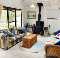  5957 Wisemans Ferry Road Gunderman NSW 2775 $750,000 So rare to find an approved house with a licensed jetty right on the beautiful Hawkesbury River. On a semi-rural 1160 square metre block is this character and stylish, light and bright weatherboard cottage. Consisting of 2 double bedrooms with approved additional studio & wonderful, fully covered & bright wide verandahs and pavilions for abundant outdoor living. There are multiple spacious indoor living areas and a combustion fire and reverse cycle air conditioning provide year-round comfort. A spacious kitchen and modern bathroom complete the package. Mangroves frame the jetty, providing a delightful arched covered pathway to the river. There is good flat grassed yard space, with a quaint gazebo, permeated by the constant twitter of bird life. The studio offers a separate space along with a self-contained bathroom and kitchen facility and connects via the covered deck to the main home. 