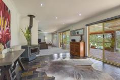 459 Kyola Road Kulnura NSW 2250 This elevated, quiet and private 27 acre holding includes approximately 10 acres of beautiful clear to semi-clear flat to gently sloping land, together with an impeccably presented large 4-bedroom home with extensive undercover alfresco entertaining area and pool, all set off by a world class Australian Native garden, offering a stunning array of spectacular Australian flora & fauna! A substantial 12.5m x 12.5m steel shed complete with 3-phase power tops off this unique package and has separate access. Separate adjacent shed, 15.8m x 4.8m. Water is plentiful via both rain tanks and bore supply for garden irrigation system. The area is a mecca for horse enthusiasts with entry opposite this property to the McPherson State Forest riding trails. The home has a near new quality kitchen, spacious bedrooms, main with ensuite, delightful main bathroom, and multiple large living areas, both formal and informal. Floor coverings and window treatments are all to a high standard. There is air conditioning and a large combustion fire. The home requires no work by the new owners and offers a wonderful retreat for buyers wanting a peaceful, rural lifestyle on the back doorstep of the Central Coast and Sydney. Access to Wahroonga is via the M1 and is under 1-hour driving, while the facilities of the Central Coast are less than 30 minutes away. 