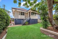  1 Essey Street Clontarf QLD 4019 $390,000 Residing on a landscaped corner allotment this attractive and well presented two bedroom weatherboard home features polished timber floors, high ceilings with ornate cornices and updated modern kitchen. There is reverse cycle air conditioning in the living area and in the kingsize master bedroom.  The bathroom has a brand new shower screen installed and there is a separate bath & WC. Downstairs is fully concreted with remote two in a row car accommodation, laundry and plenty of storage and workshop space. Further quality features of the home include: * Ceiling fans x 4, freestanding wardrobes and main bedroom bay window with window seat; * Fully fenced yard with high hedges and northern timber fencing for privacy. Capturing coastal breezes and located very nearby shops, schools, bus transport, golf course, beach pathways and bikeways here is an ideal opportunity for you to secure your first home or perhaps a seaside investment. Inspections can be arranged by appointment. A GREAT STARTER WITH SOME CHARACTER.... 