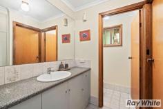  33 Baltimore Avenue Morphett Vale SA 5162 $399,000-$429,000 Located amongst other quality homes in the popular 'Thaxted Heights Estate' close to Woodcroft Shopping Centre and Woodcroft College is this beautifully presented family home set in a quiet cul-de-sac location. Ideal for any growing family the modern flexible floor plan offers a combination of both formal & informal living, a central kitchen, three bedrooms, a sensational outdoor entertaining area and room for multiple vehicles. A tiled entrance leads you to a spacious L-shaped formal lounge & dining area with bar on your left and the master bedroom is to your right. Comprising of three carpeted bedrooms, the main features a bay window, a walk-in robe and ensuite bathroom, while bedroom two has a ceiling fan and a built-in robe. A three-way family bathroom offers a large vanity unit with good storage including a linen press, a separate toilet and a shower & bathtub. The well-appointed kitchen has been cleverly designed, boasting a walk-in pantry, a breakfast bar and stainless-steel appliances including dishwasher, wall oven, hotplate & rangehood. It overlooks the open plan meals area & family room, which has all-year-round comfort courtesy of reverse cycle air conditioning. Beautifully fitted out with gorgeous timber cabinetry and some feature lead lighting, the bar is the perfect place to serve up a few drinks for friends while everyone enjoys watching the game on the big screen tv in the adjoining living area. The outside entertaining area is the outstanding feature of this home, a massive gable roofed pergola with all-weather cafe blinds, ceiling fans and lights will be the host of many birthday celebrations, family gatherings and plenty of good times to cherish forever. Positioned on a huge block of around 940m, the garden has been designed for an easy up-keep with a grassed area for the kids & pets to run, garden beds with established, easy care plants & trees, plus a fernery down one side of the house. The single carport has a manual roller door with drive through access to the large garage/workshop, offering power & lights, concrete floor and a workbench - it is a very handy space. The driveway is wide enough to park a boat or a caravan - still with the potential to park more vehicles behind the gates. Situated in a cul-de-sac ensures the safety and tranquillity for you and your family, while the laneway next door offers the convenience of easy access to the highly regarded Woodcroft College & Library, the Woodcroft Tavern for a quick meal & the Town Centre Shopping Mall for all your groceries. Located within close distance to medical services, recreational facilities, several parks & reserves, early learning centres and public transport. 
