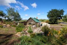  2 Parkham Rd Elizabeth Town TAS 7304 $439,000 Location Location Location – you won’t find many better than this renovated massive home on approximately 1/2 an acre (.2 hectares) that has multiple opportunities for usage due to size, configuration and Location Location Location ! Ideally situated on a corner block right on the famous Cradle to Coast Tasting Trail with stunning uninterrupted 360 degree views of the Tasmanian countryside and bushland, this almost completely renovated and updated in last 4 years- from top to bottom home. Five bedrooms (2 are considered Master-one with ensuite and study area, and one with dividing wall which has a walk in robe, dressing room and study area on other side ) and 2 others also have BIR’s.  Want more ? No problem- 2 bathrooms, dedicated study/office with built in bed, massive undercover sunroom/entertaining area with brand new decking, 2 carports, 2 long private driveway entrances from both the Bass Highway and Parkham Rd with multiple ‘designated’ parking areas available and plenty of room to build at least one other 4 vehicle carport or garage or massive shed STCA where the land has recently been leveled and already graveled for you at back of home, 2 brand new 22,000 ltr water tanks, 3 reverse cycle air cons for both heating and cooling, established gardens with considerable space to re-establish lawns (front yard has very recently been excavated and leveled), put in a chicken shed or a large vegie garden. Ask the agent about the secret room/storage area upstairs with the entry through door at back of the built in wardrobe-who wouldn’t like their very own Narnia !   Still want more ? No problem-STCA, and with a few minor alterations, you could use one side of this home as an AirBNB or private rental as there is a hallway that effectively makes one side of this massive home a separate wing, live in main part of home and rent the other part,  or may be ideal for a share home, family wanting to accommodate older relatives in separate wing whilst still being close by-so many viable options limited only by the imagination! Situated on the famous Cradle to Coast Tasting Trail that has maximum exposure to both locals and passing trade, and with the added bonus of an easy commute to either Launceston or Devonport and only 8-10 minutes to Deloraine, STCA you could set up a business or work from home in at least 3 different study/office areas.  