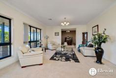  28 Beacon Place Googong NSW 2620 $2,100,000 With commanding 360-degree views from the top of the hill sits this grand residence sprawling over 557.1m2 under one roof line. There is an additional 113.7m2 of verandahs plus covered entertaining areas as well as garaging. The property has surveillance cameras, electric gate and intercom. Through the gate you are lead up the long tree and light-lined sealed driveway to the grand home. The home consists of a large formal lounge and dining room at the front that leads you to a stunning open plan kitchen and family meals area which overlooks the rear entertaining areas and gardens. The kitchen is an entertainer’s dream offering endless stone benches and storage. There is also a walk-in pantry that is large enough to get lost in. Down the extra wide hallway, you will find the massive rumpus/media room. This home offers a parent’s retreat like no other the size of which needs to be seen to be believed. This walk-in robe is fashionista’s dream and the large resort style ensuite offers spa, large shower, separate toilet and heated floors. The remaining 3 spacious bedrooms all offer built-in robes. This home offers two studies, the main study boasts its own entrance and is large enough to be split into 2 additional bedrooms. The second study is located at the opposite end of the home, providing flexible study/work from home options. There is a large three-way main bathroom which services the three bedrooms. Adjacent to this area is the functional and spacious laundry. At the garage end of the home there is a powder room. The oversized 3 car garage provides excellent storage and workshop space along with remote roller doors and internal access. There is also an oversized double garage perfect for any additional machinery. The fully fenced house yard is irrigated, landscaped and offers large level lawn areas along with easy care and established gardens including vegetable beds and fruit trees. There are front and rear covered entertaining spaces which overlook gardens and a stunning vista. The remainder of the property has been divided into paddocks with water troughs and shelter for stock. The current owners run Alpacas on the property. Features: – Grand formal lounge and dining room – Stunning open plan kitchen and family room – Large rumpus/media room – Retreat style master bedroom with walk-in robe and ensuite – Remaining bedrooms all spacious in size with built-in robes – Large home office offering its own entrance – Picturesque views from every room – Additional study at garage end of residence – 2.9m ceilings throughout – Double glazed windows throughout – Ducted reverse cycle air conditioning with 6 zones – Large covered entertaining spaces either side of the home – Oversized 3 car garage attached to house – Additional 2 car garage, 6m x 7m – Double carport attached to house – 110,000ltr concrete rainwater tank – Additional large water tank attached to shed – 500kl per annum bore water supply – 3 phase power to home – 240v power to front gate with driveway lights – 40+ solar panels – Sealed driveway – Automated irrigation system to gardens and lawns – 557.1m2 of house plus 113.7m2 of verandas 670.8m2 total covered – 2.41 Hectares (5.9 acres) 