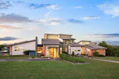  29-31 Hennessy Drive Dundowran Beach QLD 4655 $1.38 Mil Not just a home, but a living breathing environment. Bringing you the quintessential home for Queensland living... designed to capture all the elements of the location. Positioned high in prestigious Dundowran Beach, and sitting on a 3,486m2 allotment, this architecturally designed home has been thoughtfully constructed to create balance and harmony with a strong focus on sustainability and self-sufficiency. The best of modern 'green smart living'. The home is highlighted with many artistic features and a clever use of natural materials. From the repurposed ship wood front door on entry to the recycled rubber shingle roof imported from the U.S. Original designer pendant lighting throughout, handcrafted coloured glass windows and Blackbutt timber flooring all contribute to the detail and thought put into the design of this home. Rammed earth feature walls flow throughout, improving the thermal control & noise reduction. 29-31 Hennessy Drive is an inspirational home offering: Spacious entrance foyer connecting to the informal living and dining area North facing alfresco entertaining area with automatic retractable roof, designed to maximise use throughout the seasons Beautifully designed kitchen with granite stone benchtops, integrated Miele and Liebherr high performance appliances, walk in pantry and servery to the alfresco area Substantial parents retreat located upstairs, with separate lounge area, walk-in wardrobe, ensuite and private deck capturing the sea views and district outlook Three additional bedrooms, two with deck access and all uniquely appointed The study and spacious second living area give this home another secluded living zone Concrete chlorinated pool with mosaic tiling 15,000L rainwater tank underneath the house for servicing the garden Separate, two-bedroom, self-contained executive parents retreat, built to the same quality standards of the home With central Hervey Bay only an eight minute drive, all major conveniences such as shopping centres, schools, hospitals and the airport are within an easy drive. The local Dundowran Beach is only a short walk with many natural reserves, vine forests and lagoons to explore on your doorstep. The MULTI AWARD winning home needs to be inspected to truly be appreciated, call Marie or Eli to arrange an inspection. FEATURES: • 	 Built-In Wardrobes • 	 Fireplace(S) • 	 Garden • 	 Polished Timber Floor • 	 Secure Parking 