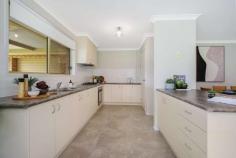  26 Orchard Way Lavington NSW 2641 $475,000 Featuring the neatest of properties, in the most ideal location, with new floor coverings, window furnishings, bathrooms plus fresh paintwork throughout, you will instantly feel at home here. Comprising three bedrooms inclusive of built in robes plus a study or a fourth bedroom, positioned close to the master suite, this would be the perfect nursery! The main bedroom has a walk in robe and a brand new ensuite. The formal lounge is also positioned in this zone of the home, a great space to curl up and relax with a glass of wine and a good book! Ducted heating and cooling ensures comfort all year round. The bathroom is also completely renovated, ready for you to be the first to soak in the bathtub. The laundry and toilet are separately appointed. Spacious open plan kitchen, dining and living area flows aimlessly to the impressive outdoor entertaining area. The kitchen is equipped with plenty of storage and bench space with a gas cooktop. Outdoors, there is a double garage under roofline, with the convenience of remote access and also a roller door to access the yard, plus double side gates leading into the spacious secure yard. Lush green grass, provides plenty of space for the kids to play and offers ample room to build a shed or pool (STCA) if you desire or to securely store a caravan, boat or trailer. You'll host plenty of events from the alfresco area, a great place to enjoy backyard BBQ's! Perfectly positioned on approximately 859m2 block, close enough to walk the kids to the Lavington Public School and beautiful parklands with all of it's wonderful natural flora and fauna and superb walking trails - Your new relaxed lifestyle awaits and we're confident this fresh and fabulous package will impress! FEATURES: • 	 Air Conditioning • 	 Built-In Wardrobes • 	 Close To Schools • 	 Close To Shops • 	 Close To Transport • 	 Garden. 