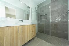  2/43 William Street Wodonga VIC 3690 $545,000 Central Wodonga properties are highly sought after… but we’ve found you one! Only 1km from Wodonga’s town centre, this quality built townhouse is beautiful, modern, and offers the lifestyle convenience that only comes from living in the heart of town. This perfectly appointed upmarket townhouse is one of two on the block on its own title. Positioned to the rear on a low maintenance 467m2 (approx.) lot, leaving you nothing to do but to enjoy all the creature comforts this home has to offer. The floor plan was designed with practicality in mind, and constructed with particular attention to detail. Comprising of three large bedrooms, the master suite is located to the front on the home and offers walk-in-robe smartly fitted out with built in cabinetry, and a stunning ensuite with double shower, wall to ceiling tiles, with a separate toilet. The remaining bedrooms offer built-in-robes and are serviced by the beautifully appointed family bathroom. The light and bright open plan living/dining area with northerly aspect, sits adjacent to the modern kitchen with walk-in pantry, s/steel appliances, stone benchtops, soft close draws, breakfast bar with pendant light fittings, and 900mm gas cooker. Ducted heating and cooling will provide year round comfort and the large tiled living area and entry ensures the common areas are easily maintained. The home also features high ceilings, a study nook off the grand formal entrance, downlights, modern décor and tasteful modern colour palette throughout. Outside you will find an undercover alfresco area which leads from the living area, double lock up garage with internal access to the pantry, as well as additional off street parking. Please call Terry on 0412 793 331 to organise your private inspection without delay as this property will be highly sought by many and will not last long! 