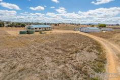  67 Evans Road Dugandan QLD 4310 $649,000 Buyers in the market for semi-rural living, far enough away from the hustle and bustle of city life, yet still a short drive to essential amenities, may find this sprawling acreage property just 10 minutes to the charming township of Boonah in the spectacular Scenic Rim, ticks more than a few boxes. On 28 fully fenced acres; the property consists of a three bedroom, two bathroom home with kitchen and kitchenette, two separate living areas, expansive wraparound verandah and open air deck – perfectly designed for dual living, along with a two car carport (tandem), 8 x 6.5 m powered shed, two dams, water tanks, and biocycle. Features of the home include solar power, gas cooking in both kitchens, air-conditioning in both of the living areas and main bedroom, ceiling fans throughout, separate shower and spa bath in main bathroom, direct deck access via French doors from master bedroom, and the ability to shut off the home (or open up) into two sections – so could suit the extended family. The land adjoins the Boonah airfield, with 777 metres frontage, for aviation and gliding aficionados, it could not be more idyllic…there is also a glorious outlook to the west across the Scenic Rim encompassing Mount French National Park. Low maintenance the acreage requires minimal work, and the sheer size of the property provides great privacy. Its industrial zoning opens up future possibilities as this region expands. An increasing number of people are embracing a lifestyle change west of the city, and properties in and around the Scenic Rim are attracting more attention. Located just a short drive to Boonah to access schools, sporting facilities, medical, shops, and dining plus 36 minutes’ drive to Beaudesert, 44 minutes to Ipswich, 1 hour and twenty minutes to Brisbane, and approximately the same distance to the Gold Coast – when you seek the bright lights of the city, it’s very ‘doable’! This is something special, something different and certainly offers a change of pace and a change of scenery. Quite a delight! Contact us to arrange your very own private inspection today. Open 7 days Phone 07 3203 6001 (24 Hours) WE ARE TAKING ALL CARE AND PRECAUTIONS REQUIRED DURING THIS COVID-19 FLU VIRUS EVENT.. Features we love : • 28 acres just 10 minutes to Boonah • 3-bedroom, 2 bathrooms, 2 living areas • Kitchen + kitchenette with gas cooktops • Wraparound verandah + large open-air deck • Views across adjoining airfield & national park • Designed perfectly for dual living • Fully fenced, 2 dams, water tanks, Biocycle • Tandem carport for 2 + large powered shed • Zoned industrial – future possibilities • 36 minutes to Beaudesert, 44 mins to Ipswich • 1 hour 20 mins approx. to Brisbane & Gold Coast • Something different, a change of pace & scenery! 