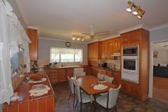  95-97 State Farm Road Biloela QLD 4715 $430,000 Located on the top of State Farm Road on 2 allotments totalling 1,441 square metres. The massive 2 story family home is built on one allotment and the shed is on the other with plenty of room for an extra shed, another dwelling or a pool. Constructed of hardwood frame and flooring and concrete tile roof the exterior has been cladded with Celuform Cladding. The lounge measuring 8.5* metres x 5.6* metres opens onto a 12* metre x 7* metre patio. Downstairs is the lounge, kitchen and dining, office or sewing room, laundry, guest bedroom with shower, toilet. Upstairs hosts 4 bedrooms with 3 opening onto the front balcony. The master bedroom is 5* metres x 5.5* metres and has an ensuite. The family bathroom features Italian marble twin vanities, spa bath and shower plus separate toilet. Floor coverings throughout including quality Westminster wool carpets in some rooms. All bedrooms and the lounge room are cooled by air-conditioning. Tassie Oak kitchen, dish washer, space for refrigerator as well as a chest freezer. Lawn locker, greenhouse, 6* metre x 6* metre shed, double carport. $430,000 FEATURES: • 	 Air Conditioning 