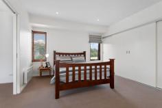  3 Falls Rise Trentham VIC 3458 $1,175,000 Come and feel the magnificence and elegance of this beautifully designed home. The celestial 4.5 metre ceilings are truly awe-inspiring, as soon as you walk in from the private, sandstone paved courtyard with its own unique water fountain feature. Set on an acre of meticulously kept grounds and gardens with crushed sandstone paths and local stone retaining walls, the home boasts of a grand master bedroom suite which consists of a full walk-in robe, spacious modern ensuite, and its own private sitting room. Two other generously sized bedrooms, all with robes, plus a study/fourth bedroom invite huge flexibility to make this into a most generous five-bedroom home. Or you can set-up a separate home office to enjoy the flexibility of the work from home experience, just one hour from Melbourne. The amazing open plan kitchen, adjacent to the dining room and living area are all linked by the rustic, reclaimed French Oak floorboards which accentuate and balances the splendour of this home. All attention to detail has been thought of in the amazing kitchen with stone benchtops, functional walk-in pantry, and quality electrical appliances to enhance an easy and relaxed lifestyle. Natural stone paving in the expansive rear courtyard area is perfect for alfresco dining and entertaining for extended family and friends who will want to join you in this exceptional rural retreat or home. It has been designed as a passive solar home to optimise the use of the sun in the winter months and minimise during summer. Other features include double-glazing throughout, electric-boosted solar hot water, wood heater, split system, and ceiling fans for all season comfort. For the garden lover, there exists a 16,000 litres of tank water, a garden shed with power and double garage, including a workshop area. Only a short drive from either Woodend or Daylesford, you are close to all the shopping, hospitality, and services you need in the close Trentham community. This is a rare and splendid find, one not to mis out on. 