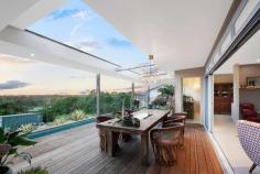  29-31 Hennessy Drive Dundowran Beach QLD 4655 $1.38 Mil Not just a home, but a living breathing environment. Bringing you the quintessential home for Queensland living... designed to capture all the elements of the location. Positioned high in prestigious Dundowran Beach, and sitting on a 3,486m2 allotment, this architecturally designed home has been thoughtfully constructed to create balance and harmony with a strong focus on sustainability and self-sufficiency. The best of modern 'green smart living'. The home is highlighted with many artistic features and a clever use of natural materials. From the repurposed ship wood front door on entry to the recycled rubber shingle roof imported from the U.S. Original designer pendant lighting throughout, handcrafted coloured glass windows and Blackbutt timber flooring all contribute to the detail and thought put into the design of this home. Rammed earth feature walls flow throughout, improving the thermal control & noise reduction. 29-31 Hennessy Drive is an inspirational home offering: Spacious entrance foyer connecting to the informal living and dining area North facing alfresco entertaining area with automatic retractable roof, designed to maximise use throughout the seasons Beautifully designed kitchen with granite stone benchtops, integrated Miele and Liebherr high performance appliances, walk in pantry and servery to the alfresco area Substantial parents retreat located upstairs, with separate lounge area, walk-in wardrobe, ensuite and private deck capturing the sea views and district outlook Three additional bedrooms, two with deck access and all uniquely appointed The study and spacious second living area give this home another secluded living zone Concrete chlorinated pool with mosaic tiling 15,000L rainwater tank underneath the house for servicing the garden Separate, two-bedroom, self-contained executive parents retreat, built to the same quality standards of the home With central Hervey Bay only an eight minute drive, all major conveniences such as shopping centres, schools, hospitals and the airport are within an easy drive. The local Dundowran Beach is only a short walk with many natural reserves, vine forests and lagoons to explore on your doorstep. The MULTI AWARD winning home needs to be inspected to truly be appreciated, call Marie or Eli to arrange an inspection. FEATURES: • 	 Built-In Wardrobes • 	 Fireplace(S) • 	 Garden • 	 Polished Timber Floor • 	 Secure Parking 