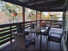  7 Scotts Close Blackbutt Qld 4314 $350,000 This 2 B/Room wheelchair friendly home has a ramp to enter the house, with a new bathroom, flooring, lighting, laundry & freshly painted inside. The large front deck will be a great place to sit back & relax , looking over the property. It has 2 reverse cycle aircon 's , ceiling fans , with 11 solar panels, fully fenced, large dam with a pump up to the well established gardens & fruit trees. It has double & single lock up garage's with power & a carport. The 2 b/room donga has power, a front deck & 10,000 lit of tank water ready for the vistor's to stay for a night. It also has 40,000 lit of tank water for the house , with an entertainment area with a 4 person spar & Bar, over looking the gardens. Also 5 x dog kennels for your pets. All the hard work has been completed, make the time to have a look. 