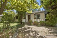  21 Claude Street Armidale NSW 2350 $220,000 to $240,000 Opportunity knocks with this pretty bungalow snuggled within established gardens on an enormous 770m2 block. Moments from the heart of Armidale, this sunny three-bedroom home is a perfect rental prospect while the land size creates knockdown rebuild options. Timber panelling and fresh new carpet feature in the large living zone with a wood fireplace radiating a cosiness and country charm. There's also a bright kitchen and a meals area while the bedrooms are blessed with new carpet and built-in robes, serviced by a family bathroom with corner spa bath. Outdoors, a covered entertainers' deck flows to a good-sized rear garden flanked with green lawn and tall trees to create privacy. A secure double garage and an extended pergola provide ample off-street parking for an additional two cars. An easy five-minute drive to both Armidale Central and the University of New England, close to pre-schools, primary and secondary schooling, your everyday essentials are well catered for. Exuding investor appeal in a prime location, arrange your inspection today. *We have obtained all information in this document from sources we believe to be reliable; however, we cannot guarantee its accuracy. Prospective purchasers are advised to carry out their own investigations. 