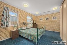  2 Roger Road Morphett Vale SA 5162 This neat & tidy, solid brick family home offers a flexible layout for families and is set on a huge corner allotment of around 860m in this ever-popular suburb with local conveniences at your fingertips. Built in 1963 the home boasts three good size bedrooms, main with a built-in robe & bedroom two has a ceiling fan, a separate study/home office and the lounge room has a split system air conditioner to keep you comfortable while you are relaxing in this spacious area. The functional kitchen is conveniently located adjacent the meals area/dining room, with a door opening out to the rear yard. In good, original condition the family bathroom comprises of a shower, bathtub, vanity and a separate toilet, while there is second shower, toilet & hand basin located between the main bedroom & the study. The gardens are low maintenance, the fully fenced backyard is pretty much a blank canvas and offers established trees & shrubs, large lawned area and a storage shed with concrete floor. Presenting many options for the lucky new purchaser, include - enjoy the large space as it is, get your hands dirty and create your own backyard oasis, erect that big garage/workshop you've always wanted (access from Trinity Road), install a pool for the kids - just let your imagination run wild (all stcc). If you are a developer who appreciates the fantastic location, the massive corner block could potentially be sub-divided (stcc). Located opposite the 'Coast to Vines Rail Trail' and within walking distance to the infamous 'junk food corner', transport, medical services and local parks, while several shopping centres and schools including Pimpala Primary School, Southern Vales Christian College and Woodcroft College are all close by. This property could do with some TLC to make it shine again but with so much space & so many features on offer, those with vision, enthusiasm & energy will be well rewarded! For more information or inspection times, please call Jackie Scott from Ray White Port Noarlunga on 0409 090 959. 