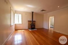  95 King Street TUMBARUMBA NSW 2653 Calling all first home buyers and investors! Central location 3 Spacious bedrooms + office Sunroom Renovated bathroom Polished boards in the living area Ducted cooling + wood heating Large fenced rear yard Single garage Neighbouring a vacant block formerly used as a park Potential rent of $280 per week.. 
