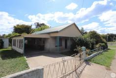  83 Murray Street TUMBARUMBA NSW 2653 $275,000 This is a great opportunity for an investor or first home buyer to purchase a three bedroom family home. • Three bedrooms - 1 with built in wardrobe, • Wood heating in the lounge in addition to gas outlet • One bathroom + second shower • Flat corner block with rear lane access • Attached single carport and numerous wood sheds • Established yards • Great location - opposite primary school and within walking distance to the main street • Currently tenanted at $295 per week until 07.03.2021 and periodic thereafter • Ideal for subdivision or further development (with approval) • Zoned - R3 - Medium Density Residential 