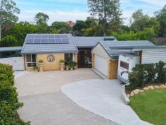  12 Poets Corner NERANG QLD 4211 $669,000 Nestled at the end of a peaceful cul-de-sac in a leafy neighbourhood this striking home with plenty of off street parking is surrounded by an abundance of birdlife and parklands all at your back door. No expense has been spared and will be obvious as you take a walk through this fully rejuvenated home. Apart from the separate double lock-up garage there is a big undercover motorhome accommodation so just lock up and head off on your family holiday. For the entertainers there is a massive entertaining area for the biggest of gatherings flowing out from the spacious kitchen. Relax all year round with your large luxury temperature controlled spa bath in private undercover outside area. The location is superb with schools and shopping so close. Whether you're going out into the night life of the Gold Coast or a Sunday drive to Mount Tamborine, both are just a 20 minute drive from your front door. Features include: Two separate living areas, air conditioning, ceiling fans, entertaining area, motorhome accommodation, solar 6kw, leaf guard, spa bath, double lock-up garage (auto), gas cooktop. 