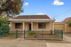  43 Hennessy Terrace Rosewater SA 5013 This symmetrical cottage is perfect for those looking to get established in this increasingly popular area with loads of potential for you to paint, polish and update to add your own personality. The home features a wide central hallway, three large bedrooms, separate lounge with cosy gas heater plus large eat-in kitchen. The home features ducted reverse-cycle air-conditioning plus security shutters to most windows. To the rear of the home is a wide all-weather verandah running the full width of the home, ideal for enjoying catching up with family and friends for a weekend barbecue or wood-oven pizza or two, that's right... you also have your own brick pizza oven! The north-facing backyard is HUGE and provides plenty of room for those looking to extend the house or for those who enjoy gardening. There are well established fruit trees including an enormous fig tree, feijoa and a grapevine covered arbour (you will feel like you are in a village in Italy, not in metropolitan Adelaide). There is a carport for three cars (with auto-roller door) that drives through to the large garage (with pit) providing secure parking for two more vehicles and would make the ideal workshop for the home hobbyist. There are also several additional smaller sheds including a cute weatherboard cabin located in the back corner of the garden (relocated from the original coal mining town of Leigh Creek). Within walking distance to local public and private schools, only a short drive to the shopping and café precincts of Port Adelaide and the beach at Semaphore not to mention only a 300m walk to one of Adelaide's oldest and best Vietnamese restaurants. Situated on approximately 778m2 (16.7m x 46.4m) in the General Neighbourhood zone this may also suit those looking to demolish and start over or possibly redevelop (subject to all necessary consents). 