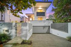  6 Tweeddale Road Applecross WA 6153 Designer style and high quality construction together with a spacious home on an easy care low maintenance block. This home is located on a quiet and leafy street that is meters to the rivers’ edge. This executive property provides the ideal lock and leave riverside lifestyle. This street frontage home has a spacious floor plan that offers undercroft double lock up garage, extra storage room, wine cellar, three double bedrooms that all open onto their own balconies, study/fourth bedroom flowing onto a large private balcony and three luxuriously appointed bathrooms. The gourmet kitchen has walk in pantry, stone benchtops, breakfast bar and bi-fold external doors that flow seamlessly onto the outdoor kitchen with built in barbeque. The open plan living and dining area also feature bi fold doors that open onto a private green oasis that features swimming pool, sauna, undercover alfresco and established easy care reticulated gardens. This light filled home has been cleverly designed and strategically landscaped to create a green outlook from every window. This high quality home has the latest in modern conveniences including reverse cycle ducted air conditioning that is individually zoned for every room. There is ducted vacuum, security alarm and security front gate with intercom. Positioned around the corner to the riverfront, this home is easy walking distance to various cafes, restaurants, shops, supermarket and both the train and bus stations. Connect easily onto freeway north and south within minutes and commute into Perth CBD directly down the freeway in 10 minutes. This contemporary property features a quality, size and location that is an extremely rare offering for this riverside suburb. For further details contact Renee Banovich on 0409 647 341. 